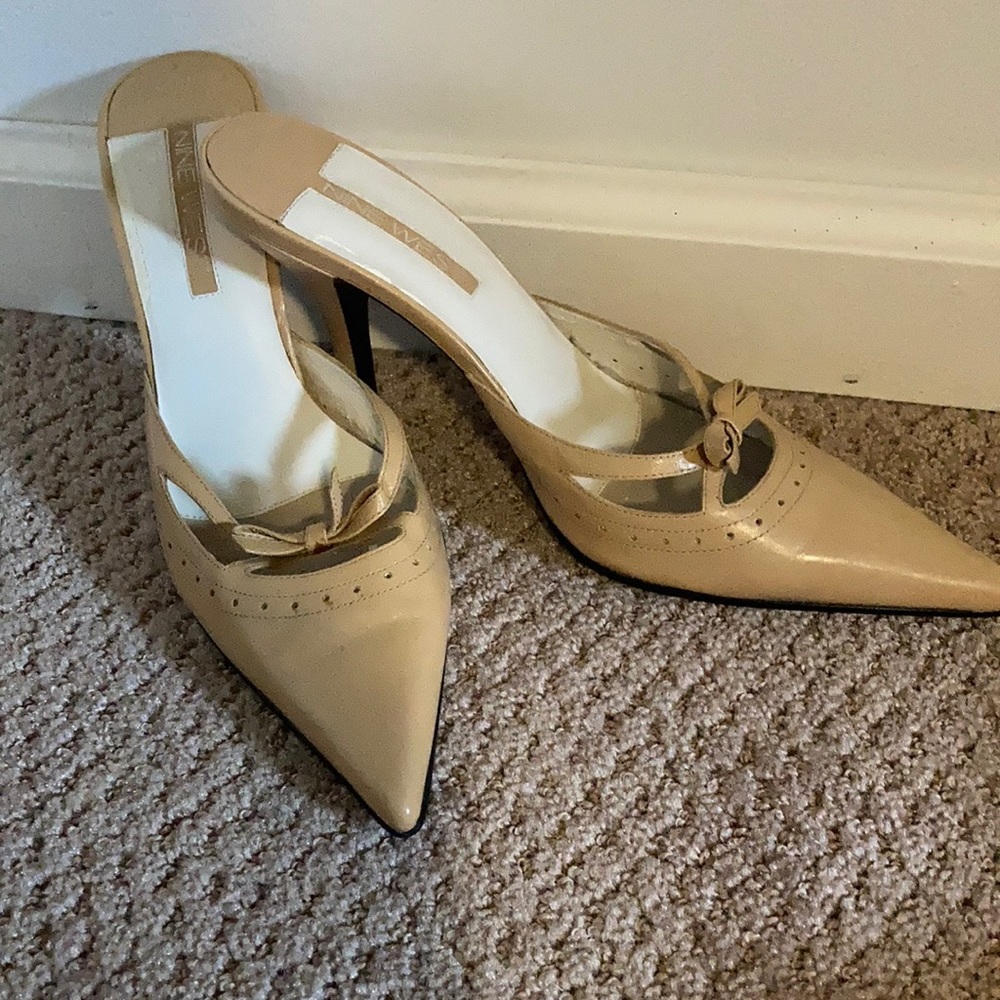 Nude mule heels.